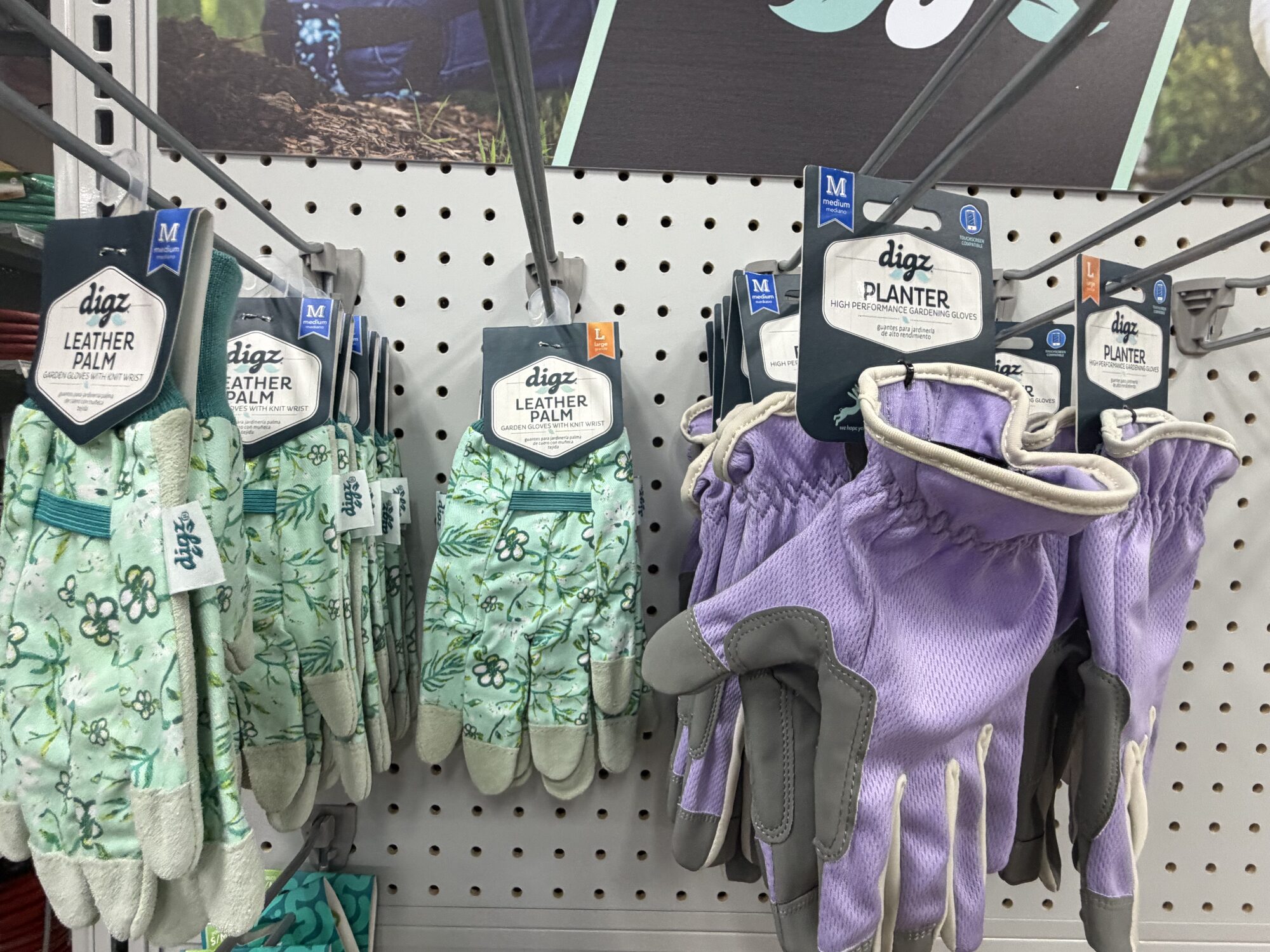 A display of Digz Leather Palm and Planter high-performance gardening gloves for sale at Hessler Paint & Hardware in Delray Beach, Florida.