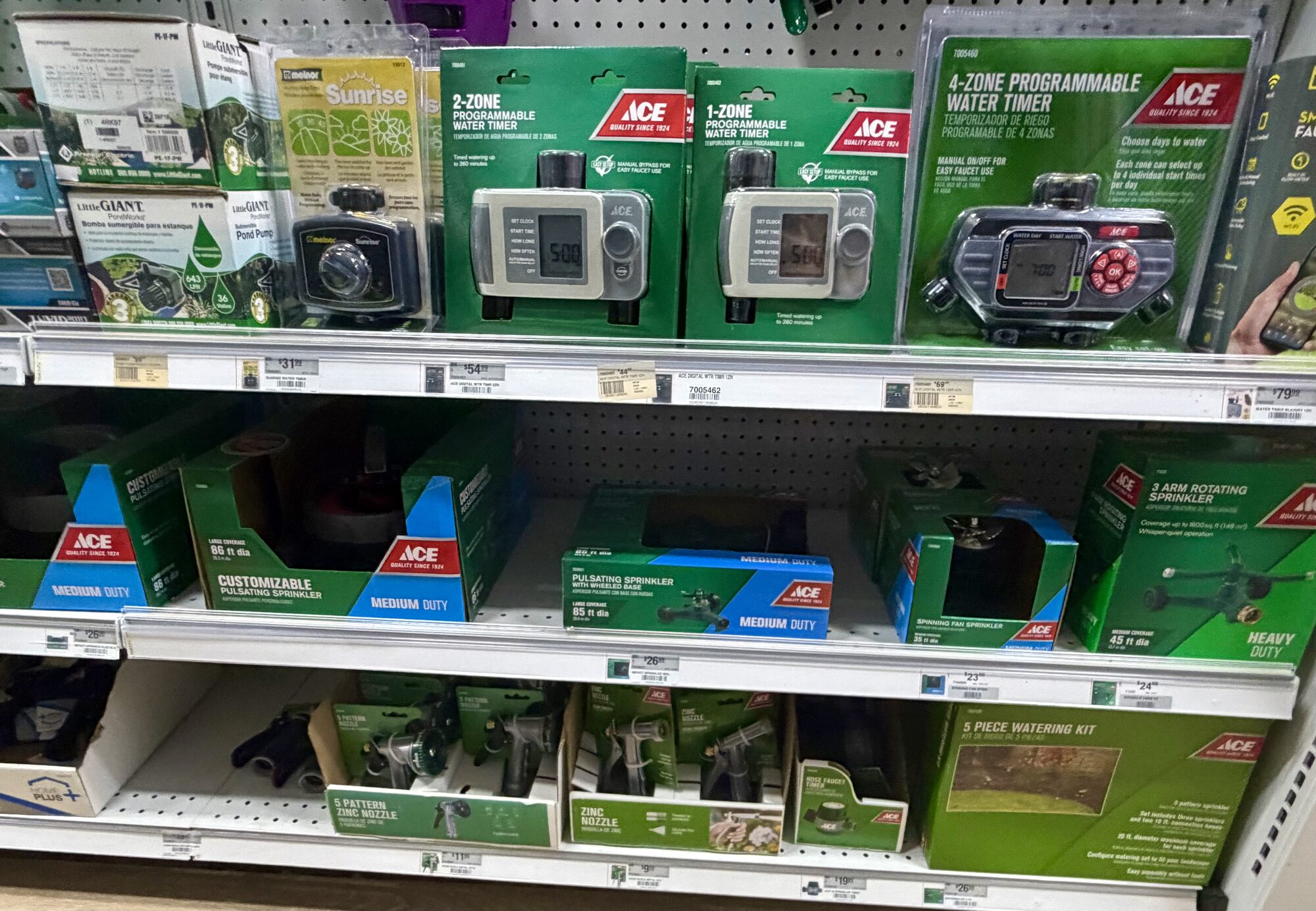 Ace brand water timers, pulsating sprinklers, and zinc nozzles on display at Hessler Paint & Hardware in Delray Beach, Florida.