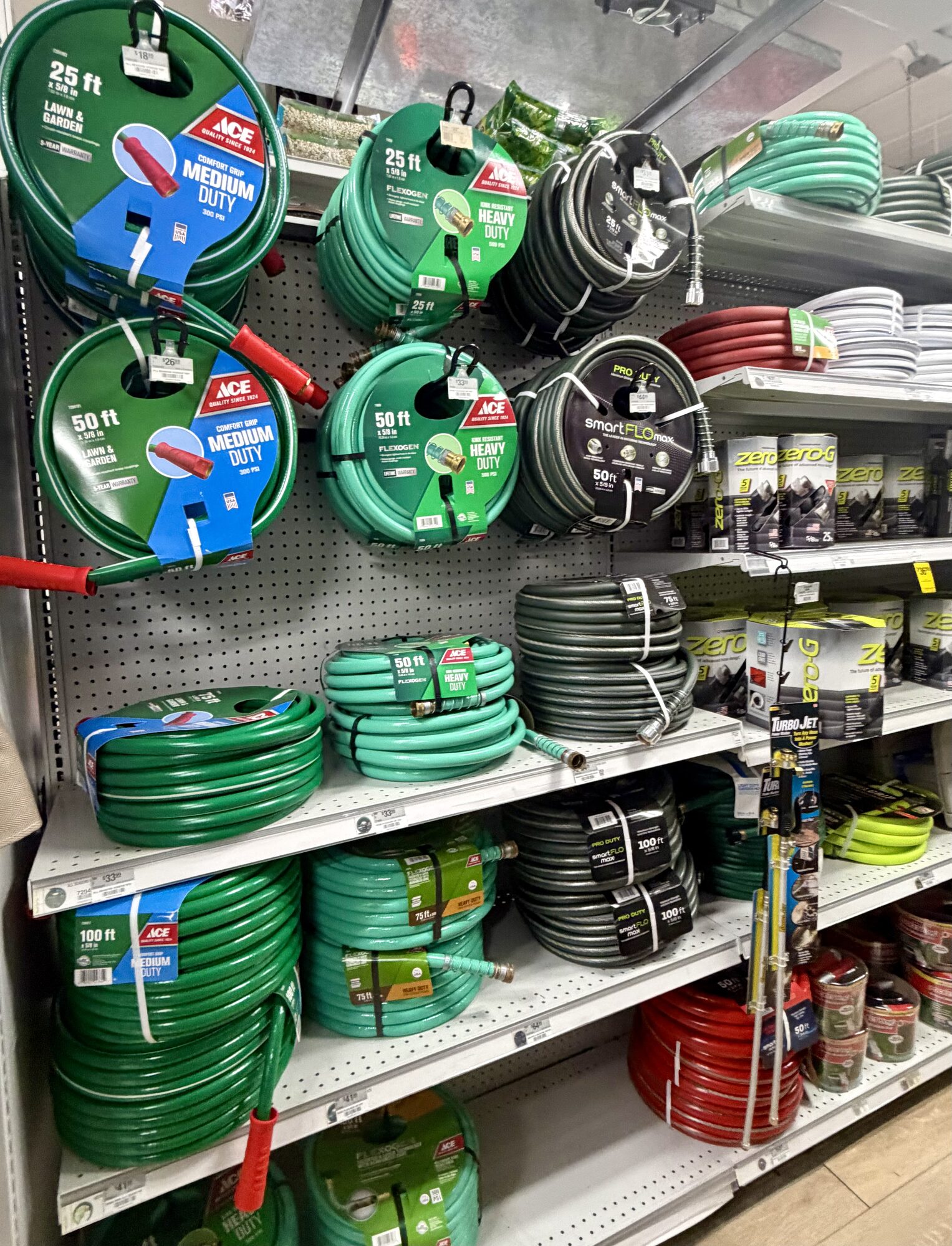A wide variety of Ace brand medium and heavy duty garden hoses and Zero-G flexible hoses at Hessler Paint & Hardware in Delray Beach, Florida.