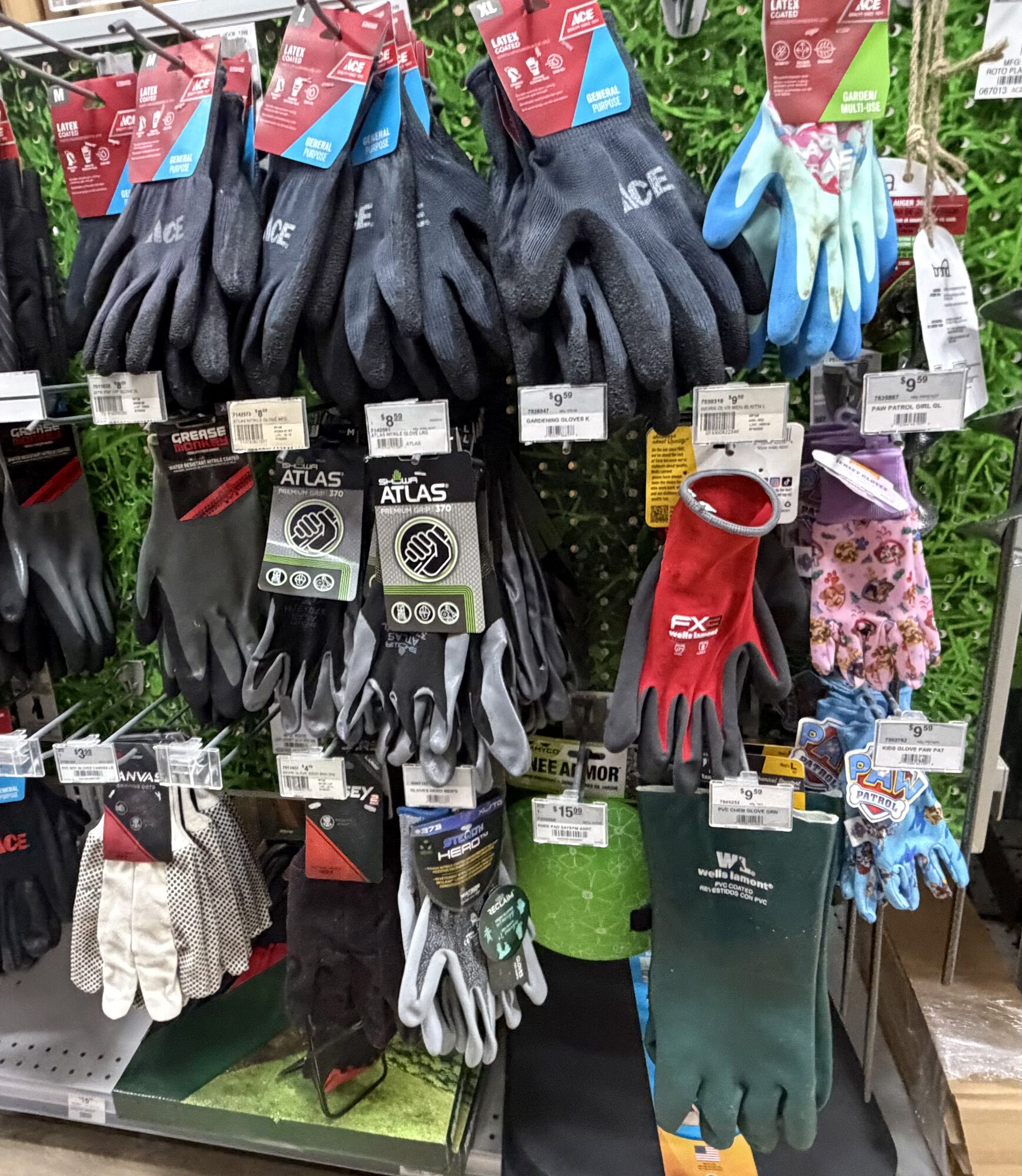 A display of Ace, Showa Atlas, and Wells Lamont work gloves at Hessler Paint & Hardware in Delray Beach, Florida.