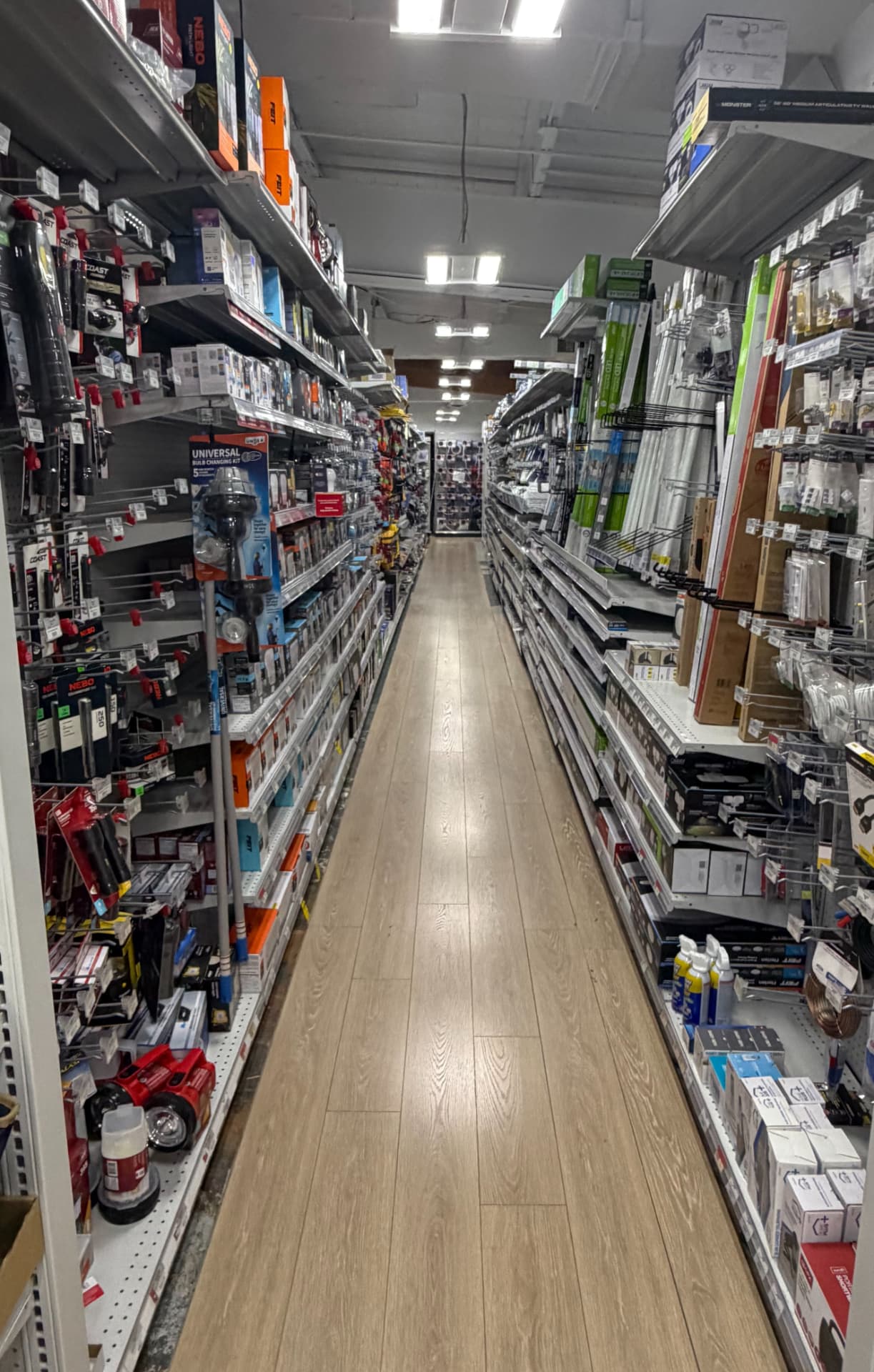 Electrical aisle at Hessler Ace Hardware in Delray Beach, stocked with flashlights, bulbs and fixtures