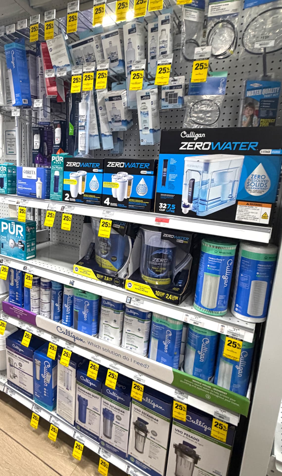 Water filtration display with Culligan whole-house filters, ZeroWater pitchers, PUR and Brita replacement filters