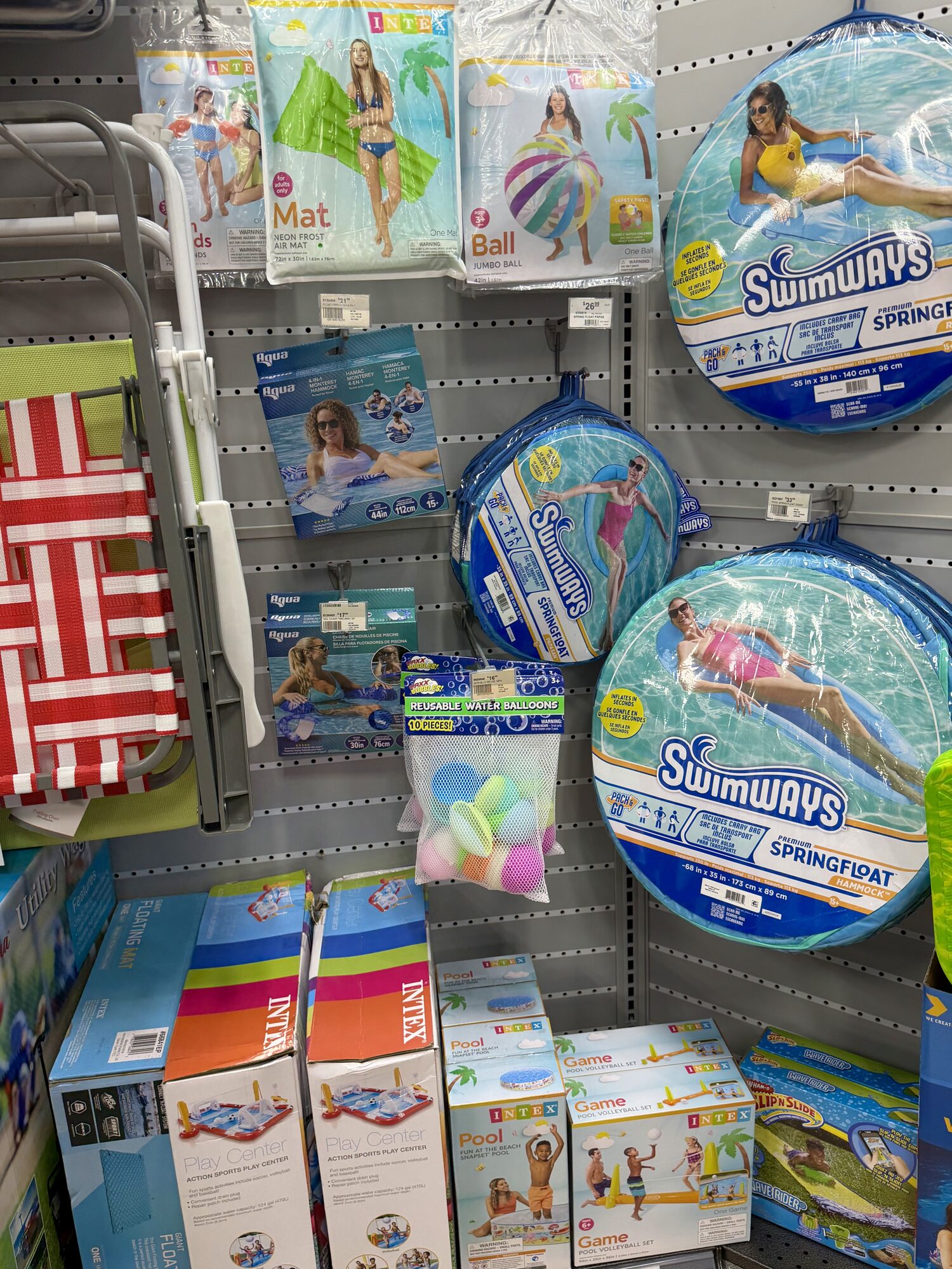Swimways Spring Floats, Intex pool mats, and Intex inflatable play centers at Hessler Paint & Hardware in Delray Beach, Florida.